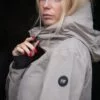 rainjacket-gletta-women-sand-pocket-closeup_1920x1920