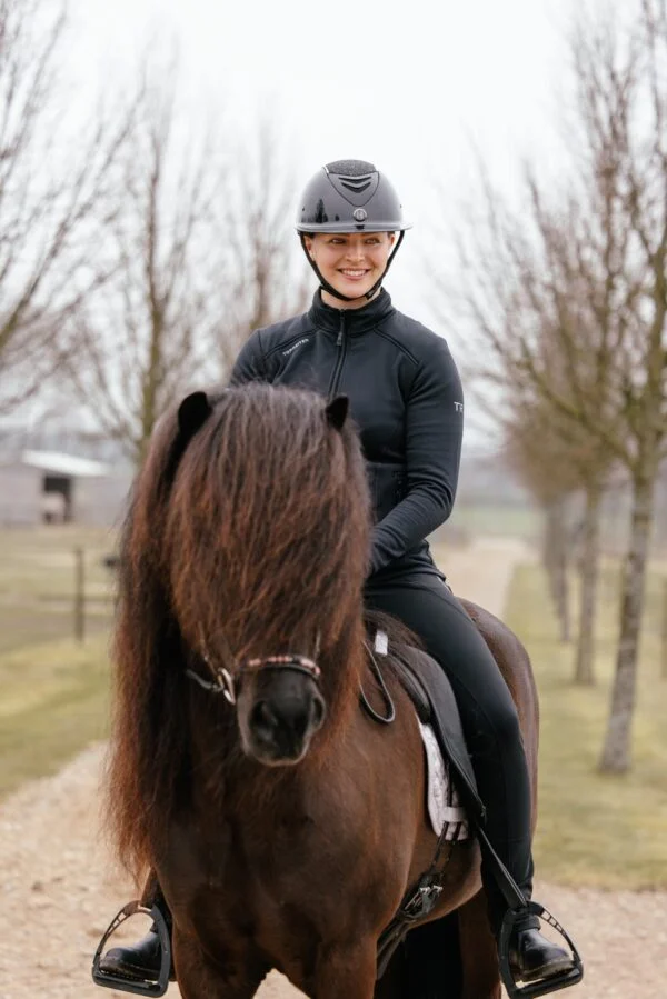 Topreiter-jacket-bylgja-black-horse-front-smile_1365x2046