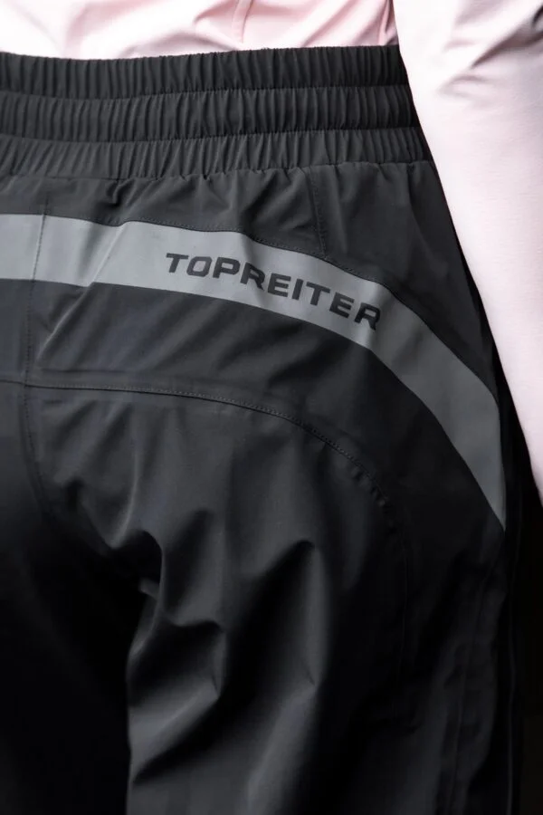 topreiter-equestrianwear-unisex-rain-pants-kari-black-back-logo-detail_1365x2048